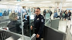 Customs officers observe the procedures in place in the port of entry at Washington Dulles International Airport, 1 April, 2024