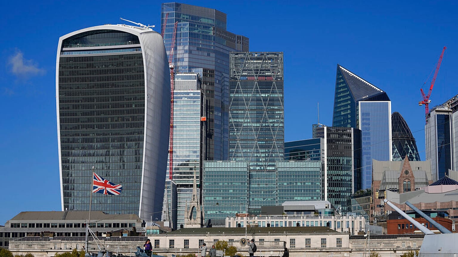 A general view of the skyline of the financial district, is seen by the River Thames, in London.