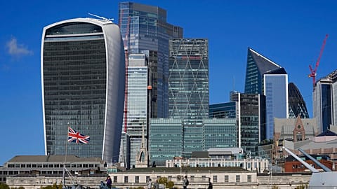A general view of the skyline of the financial district, is seen by the River Thames, in London.