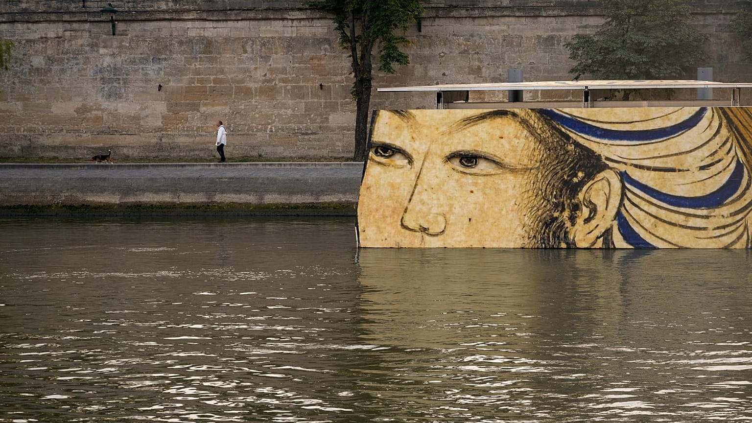 The right to flow: Paris council is seeking to grant the River Seine - pictured here with an artwork during the Olympics in July 2024 - legal personhood.