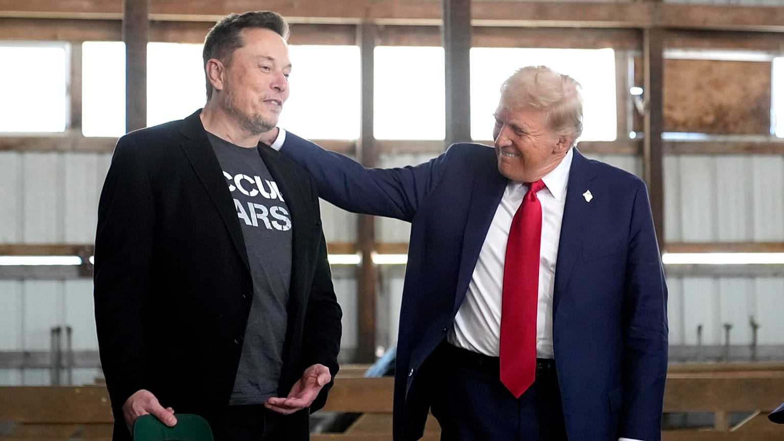 Then-Republican presidential nominee and now President Donald Trump, right, and Tesla and SpaceX CEO Elon Musk at a campaign event in 2024.