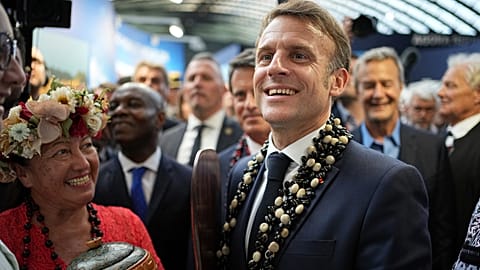 French President Emmanuel Macron visits the French Polynesia stands at "La Baleine" (The Whale) exhibition center ahead of the UN Ocean Conference Sunday, June 8, 2025 in Nice