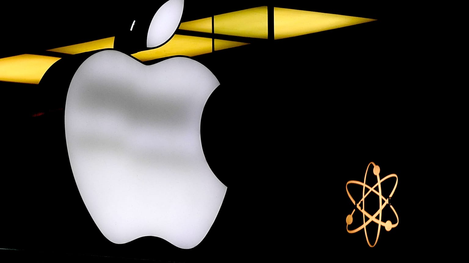 FILE - The Apple logo is illuminated at a store in Munich, Germany, Nov. 13, 2023.