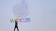 Apple CEO Tim Cook waves to attendees during an event on the Apple campus in Cupertino, Calif., Monday, June 9, 2025.