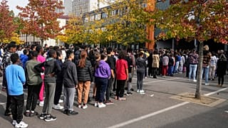Schoolchildren observe a minute of silence for the for the slain teacher Dominique Bernard at a middle school near Paris, 16 October 2023.