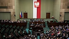 Polish Prime Minister Donald Tusk speaks to the lower house of parliament in Warsaw, 11 June, 2025