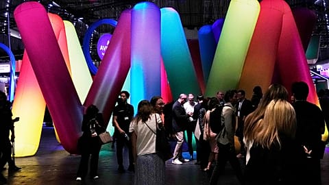 People visit the Vivatech fair ,Wednesday, June 11, 2025 in Paris. (AP Photo/Michel Euler)