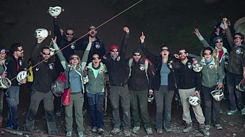 Some of the French team that participated in the "Deep Time" study, celebrate as they emerge from the Lombrives Cave after 40 days underground in Ussat les Bains