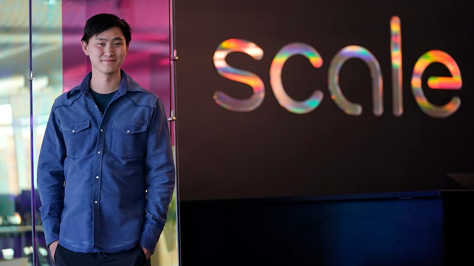 FILE - Scale AI founder and CEO Alexandr Wang poses for photos at the company's office in San Francisco, May 15, 2023.