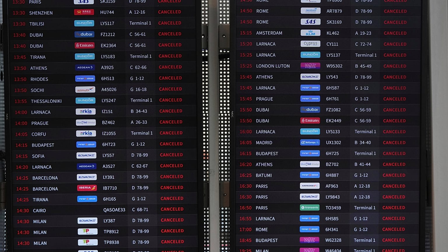 The flight information board at Israel's Ben Gurion Airport shows flight cancellations following an Israeli military strike on Iran.