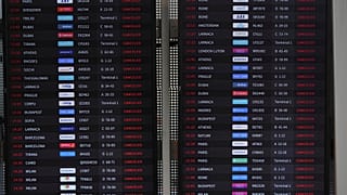 The flight information board at Israel's Ben Gurion Airport shows flight cancellations following an Israeli military strike on Iran.