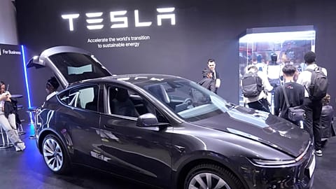 A Model Y is seen at the Tesla stand at the Vivatech fair, one of Europe's biggest technology industry fair, Wednesday, June 11, 2025 in Paris. 