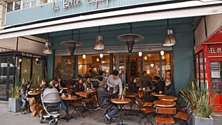 People sit at the renovated"La Belle Equipe"cafe in Paris, France. 21 March 2026.