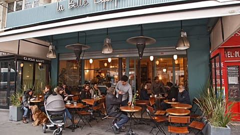 People sit at the renovated"La Belle Equipe"cafe in Paris, France. 21 March 2026.