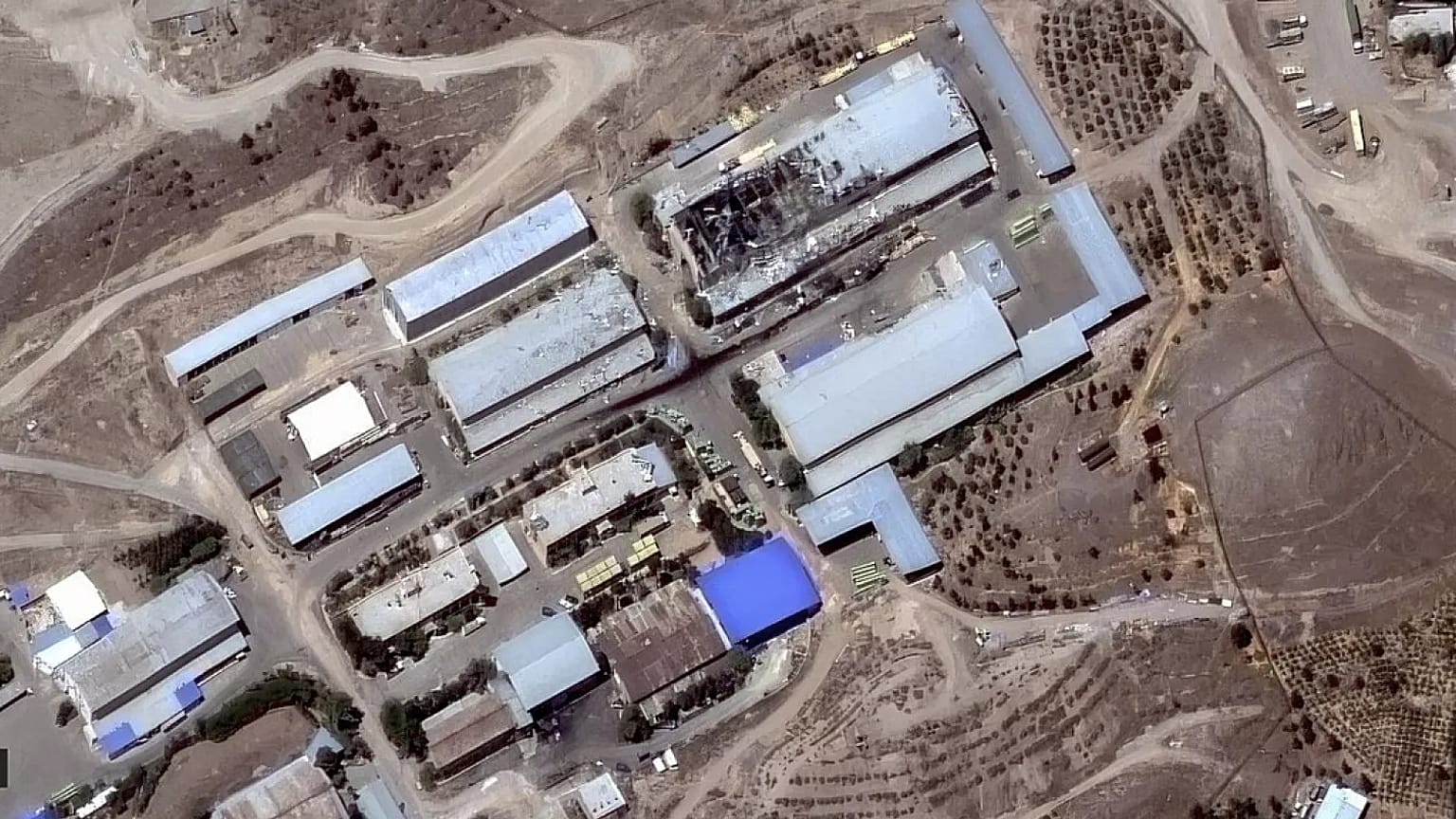 This satellite image provided by Maxar Technologies shows the IRGC Ghadir site in Teheran, Iran, after being hit by Israeli airstrikes, on Saturday, June 14, 2025.