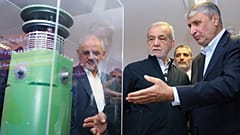 Il presidente iraniano Masoud Pezeshkian insieme al capo dell'Organizzazione per l'energia atomica Mohammad Eslami a una mostra sui successi nucleari, Teheran, 9 aprile 2025
