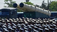 FILE: A missile system is carried on a truck during a parade commemorating National Army Day near Tehran, 18 April 2025