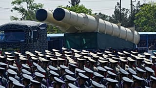 FILE: A missile system is carried on a truck during a parade commemorating National Army Day near Tehran, 18 April 2025