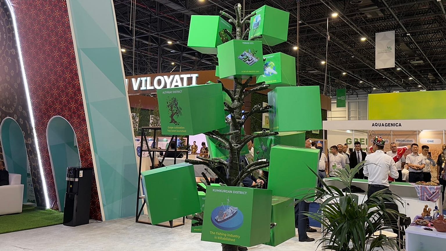 A “green tree” highlights eco-projects from across Uzbekistan at Eco Expo 2025.