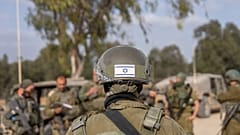 FILE: Israeli soldiers gather in southern Israel, 1 May 2024