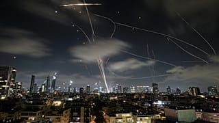 The Israeli Iron Dome air defense system fires to intercept missiles during an Iranian attack over Tel Aviv
