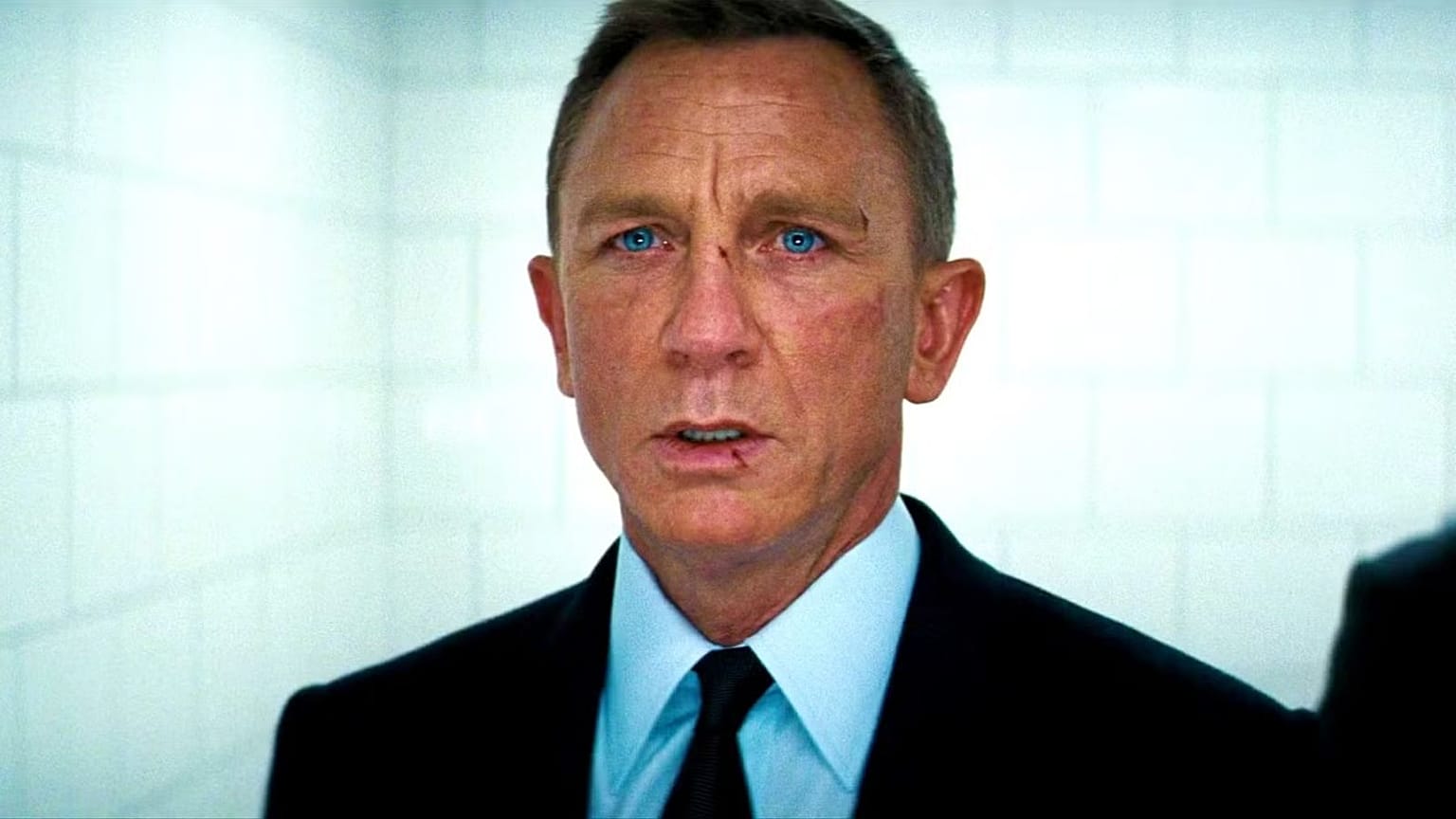 James Bond in danger: Why is 007 under threat from a property tycoon? Pictured: Daniel Craig in No Time To Die