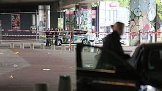 Police and forensic investigators on the scene following an attack in the western city of Bielefeld, 18 May, 2025