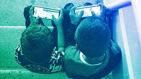 FILE: Children play games on their mobile phone, October 2024, illustration