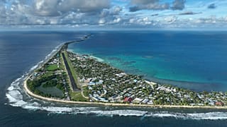 Tuvalu is trying to adapt to climate change, with technological measures including an AI weather monitoring system launched with Atmo and GCCM last year.