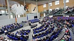 FILE: German Chancellor Friedrich Merz makes a government statement in the Bundestag in Berlin, 24 June 2025