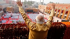 Indian Prime Minister Narendra Modi, waves during the inauguration of Kashi Vishwanath Dham Corridor,