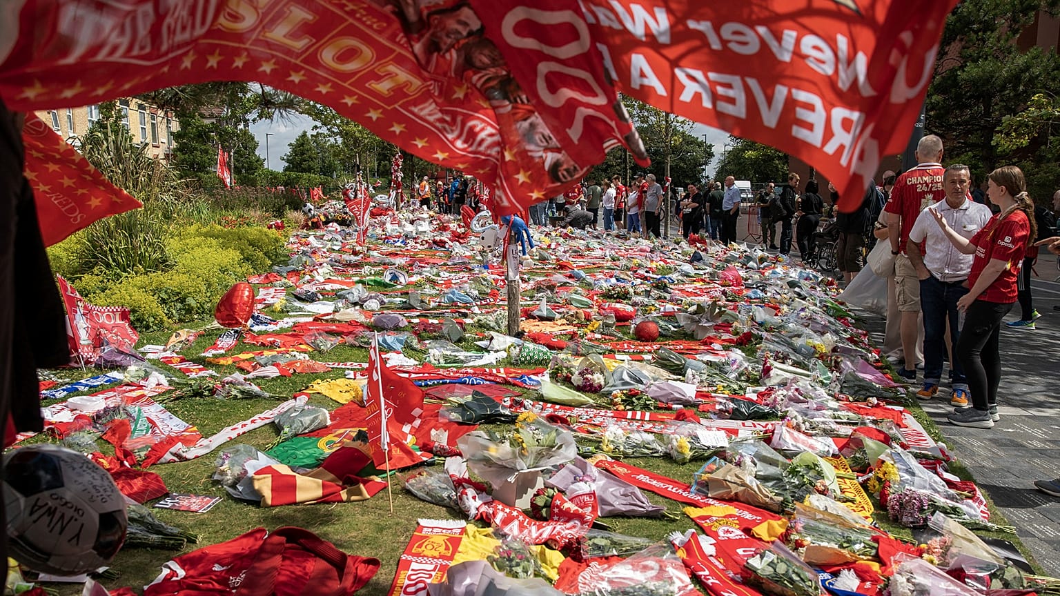 Football fans leave tributes in memory of Liverpool player Diogo Jota at Anfield Stadium, 4 July, 2025