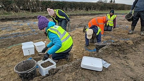 Historic England and community volunteers in trenches on the Willersey dig. 