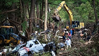 First responders carry out search and rescue operations near the Guadalupe River after a flash flood swept through the area, Monday, July 7, 2025, in Ingram, Texas.