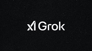 Bu fotoğrafta Grok xAI uygulamasının logosu siyah bir arka planın üzerinde görülüyor.