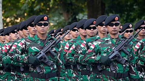 Indonesian troops march during a rehearsal for the upcoming Bastille Day parade, Wednesday, July 9, 2025, on the Champs-Élysées avenue in Paris. 