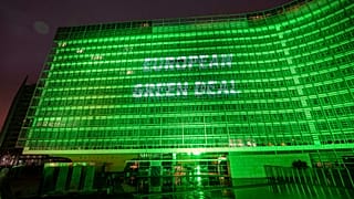 The European Commission building in Brussels lit up in green to mark the Green Deal, 14 July, 2021