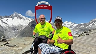 Ben Spencer and Peter Smorthit became the first to cross the Alps in wheelchairs in July.