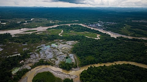 Deforestation from illegal mining is visible along rivers near Paimado, Colombia, 24 September 2024. 