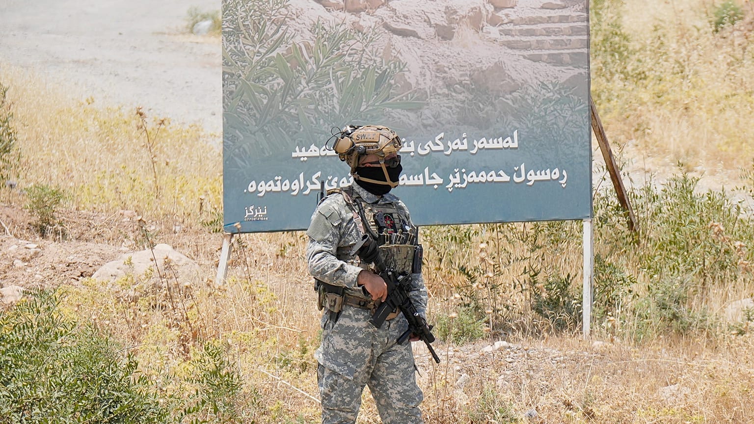 Forces of the regional Kurdish administration secure the area of the Jasana Cave ahead of a symbolic disarmament ceremony by the separatist PKK group in Iraq, 11 July, 2025