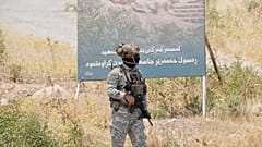 Forces of the regional Kurdish administration secure the area of the Jasana Cave ahead of a symbolic disarmament ceremony by the separatist PKK group in Iraq, 11 July, 2025