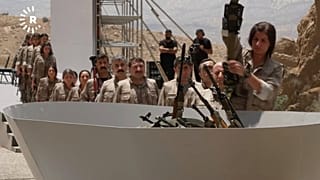 Символическая церемония сожжения оружия членами РПК в Ираке