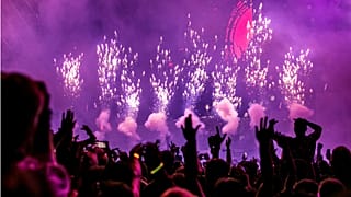 Revellers enjoy a DJ and fireworks