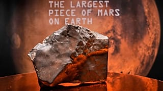 A Martian meteorite weighing 24.67 kg, said to be the largest piece of Mars on Earth, estimated at $2-4 million is displayed at Sotheby's, in New York, Wednesday, July 9, 2025
