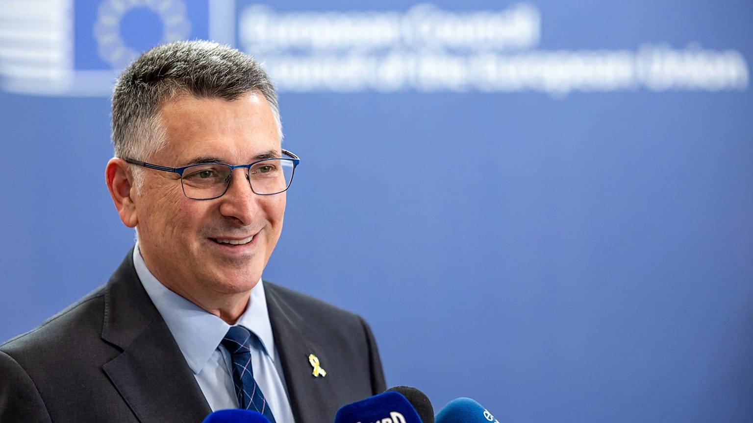 Israel's Foreign Minister Gideon Sa'ar talks with journalists at the EU Council building in Brussels, 14 July, 2025