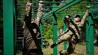 Newly recruited soldiers of the 3rd assault brigade train in Kyiv, Ukraine, Friday, May 17, 2024. A divisive mobilisation law in Ukraine came into force on Saturday, as Kyiv s