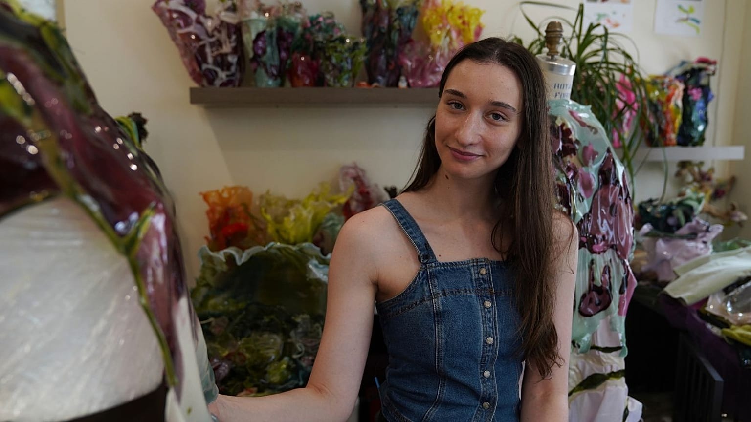 Fashion designer Caroline Zimbalist poses in her studio on Friday, June 6, 2025, in the Queens borough of New York. 
