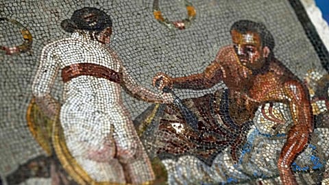 Roman mosaic depicting a pair of lovers, which was repatriated from Germany, is displayed in the auditorium of Pompeii archaeological park - 15 July 2025