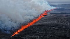 A view of the volcanic eruption by the Sundhnúkagigjarö íur volcano, in Grindavik, Iceland, Wednesday, 16 July.