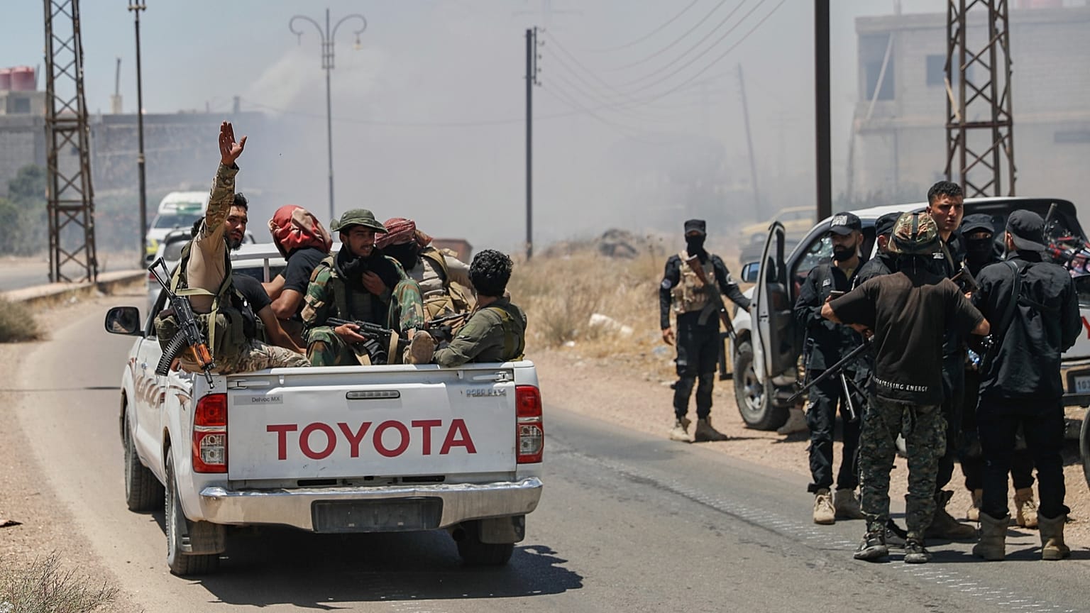FILE: Syrian government forces gather at Mazraa village on the outskirts of Sweida city, southern Syria, 15 July 2025